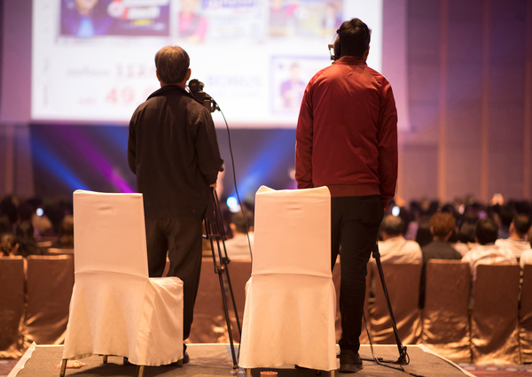 Photographers video recording activity, Video cameras is recordi